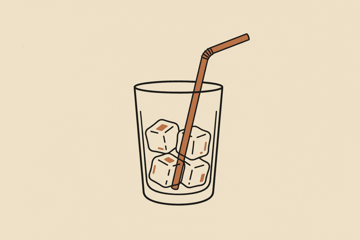 Illustration of a clear glass with a few ice cubes and a straw