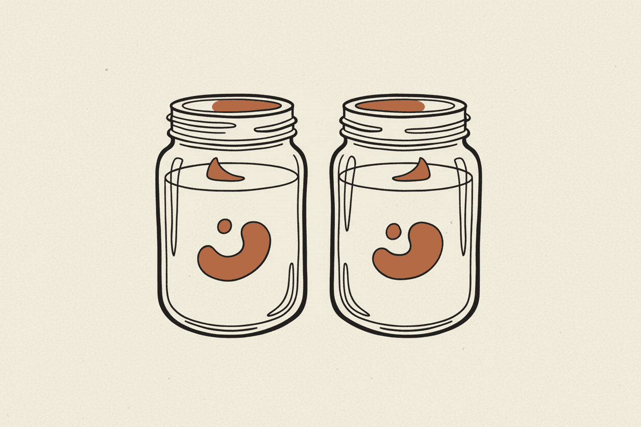 Illustration of two clear glass jars filled with creamy white liquid